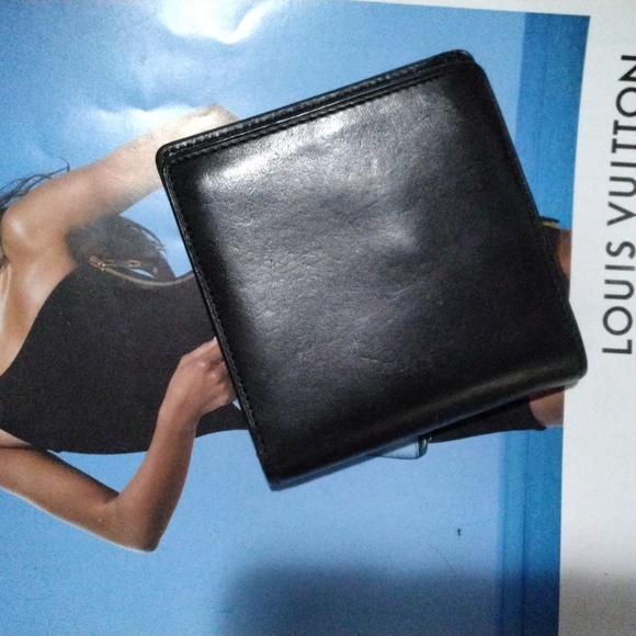 LOUIS VUITTON: "2005"; PORTEFEUILLE MARCO BIFOLD NOMADE LEATHER WALLET, #AR0065. - Picture 6 of 12